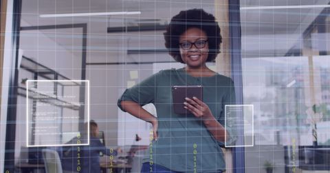 Businesswoman with Tablet Analyzing Data in Modern Office
