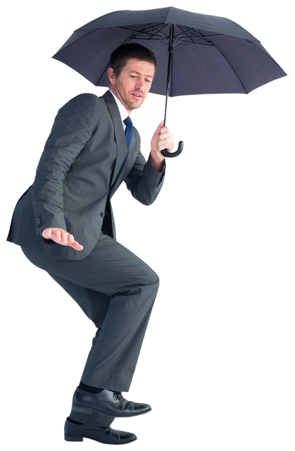 Businessman Holding Black Umbrella in Shelter Position - Download Free Stock Videos Pikwizard.com