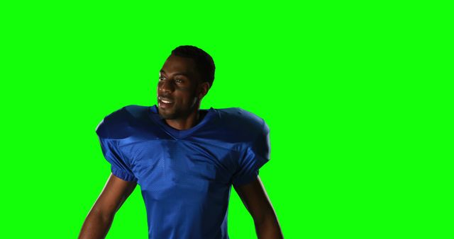 This image will be great for sports-related themes, advertisements, posters, or social media content. The greenscreen background allows easy backdrop replacement to fit various promotional or instructional contexts in American football.