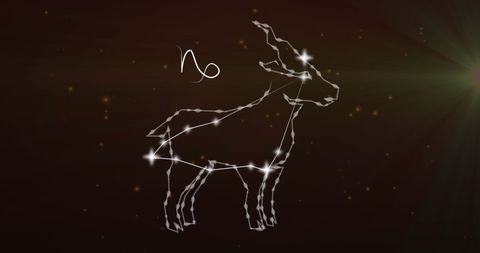 Capricorn zodiac constellation against smoky background