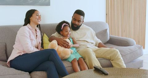 Family Sharing Pregnancy News at Home, Celebrating Togetherness