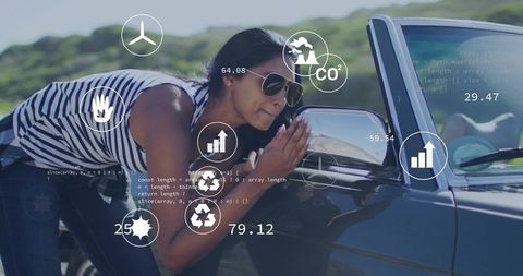 Indian woman inspecting convertible side mirror with analytics overlays and eco icons