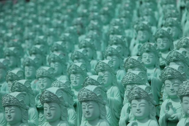 Multiple Jade Buddha Statues in Rows Creating Serene Atmosphere - Download Free Stock Photos Pikwizard.com