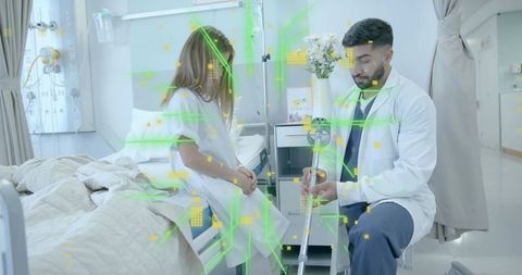 Pediatric doctor demonstrating crutch adjustment to child patient in modern hospital room