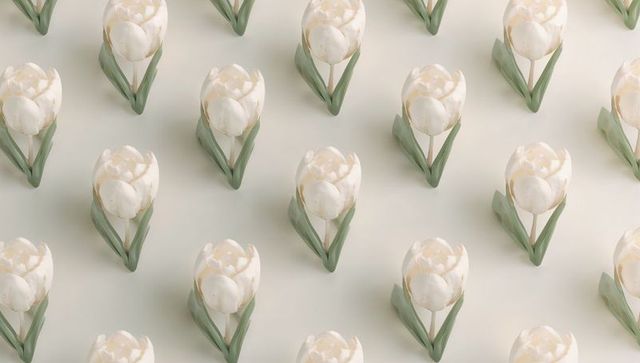 Repeating ivory tulip pattern with green leaves and soft shadows for minimal design