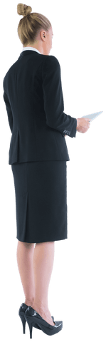 Blonde Businesswoman Using Transparent Tablet from Rear View