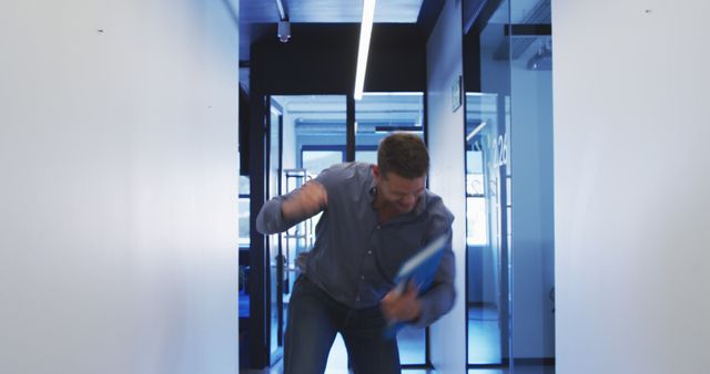 Frustrated Office Worker Hitting Door with Folder in Hallway - Download Free Stock Images Pikwizard.com