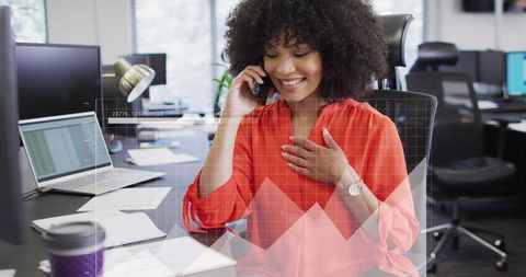 Businesswoman Analyzing Data in Modern Office Setup