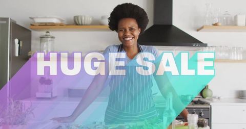 Smiling Chef Offering Huge Sale in Bright Modern Kitchen