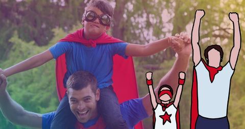 Happy Father and Son Superheroes Having Fun in Park