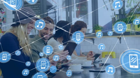 Colleagues in Modern Cafe Utilizing Digital Network Technology