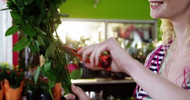 Florist Trimming Greenery with Pruners in Flower Shop - Download Free Stock Images Pikwizard.com