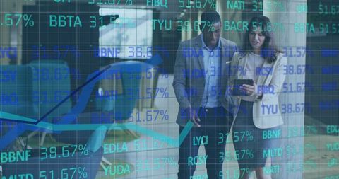 Business Colleagues Analyzing Financial Data on Tablet