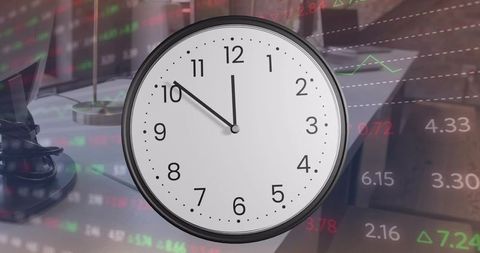 Analog clock overlaying office desk and stock market tickers representing time pressure