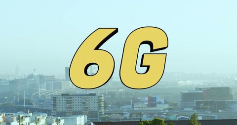 Futuristic 6g text overlaying urban cityscape