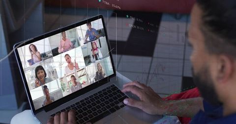 Man Typing on Laptop During 3x3 Video Conference with Stock Charts Overlay