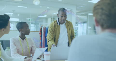 Animation Boxes Overlay Amidst Medical Team Meeting