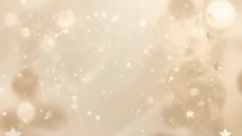 Golden particle field animation featuring festive bokeh, star confetti and soft shimmer