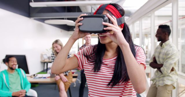 Diverse Group of Young Professionals Enjoying Virtual Reality in Modern Office - Download Free Stock Images Pikwizard.com