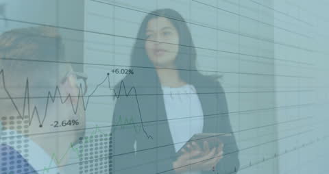 Business Colleagues Analyzing Financial Data Charts