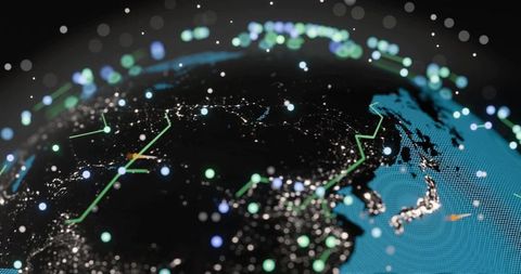 Rotating digital globe visualizing global network connectivity, city lights and data routes