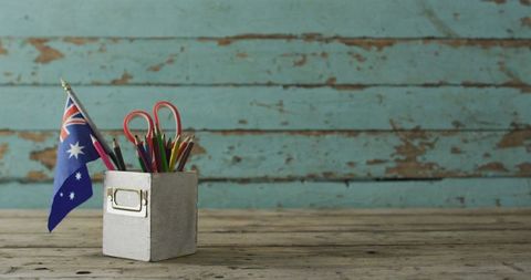 Australian Flag with Stationery on Rustic Wooden Table