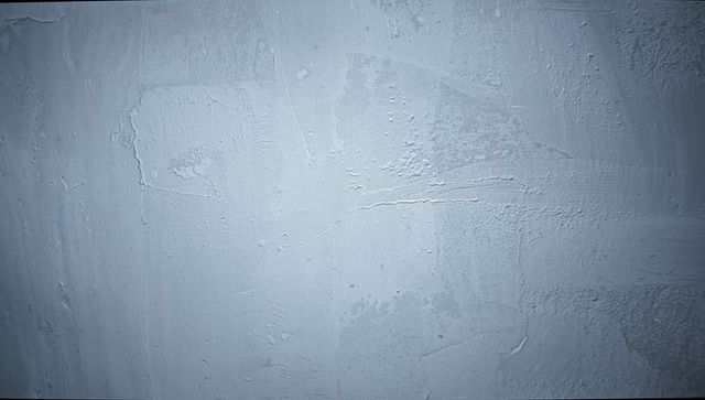 Blue-Gray Textured Plaster Wall with Trowel Marks, Subtle Gradient and Patina