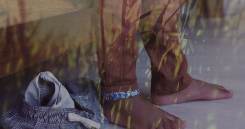 African American Child's Legs Amidst Dreamy Garden Double Exposure