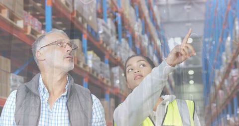 Warehouse team engaged in technology-driven logistics management