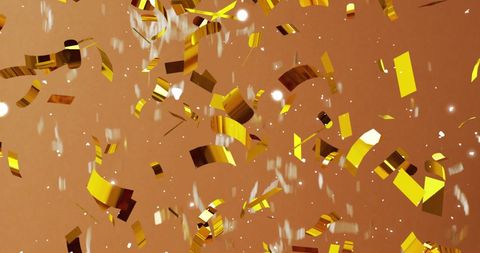 gold confetti falling on brown background celebration - Download Free Stock Images Pikwizard.com
