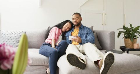 Loving Couple Celebrating Their Pregnancy at Home