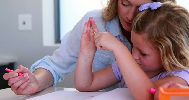 Mother Helping Daughter with Coloring - Download Free Stock Images Pikwizard.com