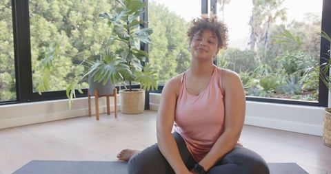 Serene African American Woman Practicing Mindfulness Yoga at Home