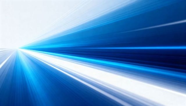 Blue light streaks racing to vanishing point conveying futuristic speed and connectivity
