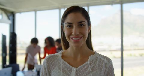 Smiling Businesswoman Standing in Bright Modern Office - Download Free Stock Images Pikwizard.com