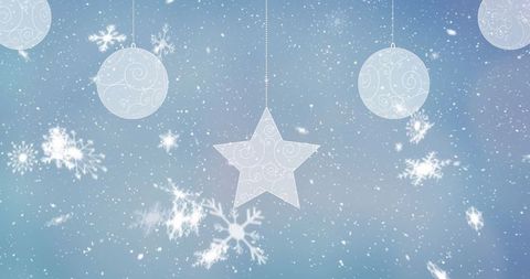 Elegant winter ornaments amidst falling snowflakes