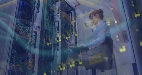 Tech Engineer Using Laptop in Secure Server Room - Download Free Stock Images Pikwizard.com