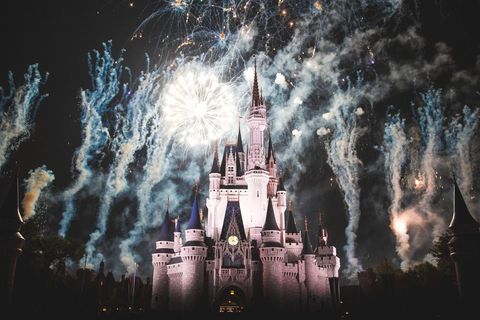 Magical Fireworks Above Majestic Castle at Night