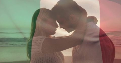 Embracing couple at sunset with double exposure beach romance and pastel color overlay