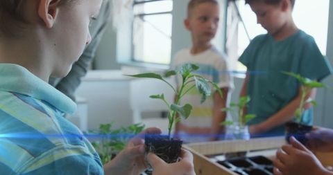 Children Engaging in Hands-On Plant Learning at School