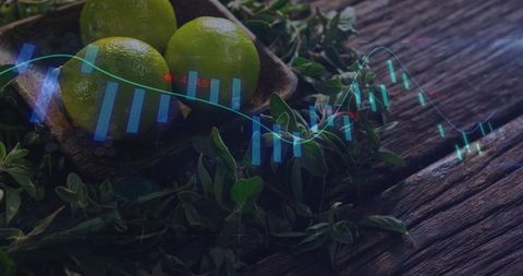 Limes resting with candlestick chart overlay on rustic wooden table