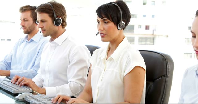 Diverse Customer Service Representatives Using Headsets and Computers - Download Free Stock Images Pikwizard.com