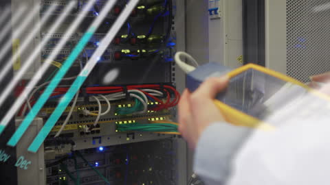 Businessman Analyzing Server Room with Digital Overlay