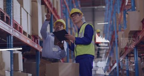 Workers Analyzing Warehouse Inventory in Logistics Operation