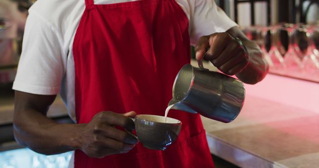 Barista Pouring Steamed Milk into Coffee Cup in Cafe - Download Free Stock Images Pikwizard.com