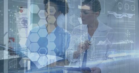 Medical professionals analyzing digital health records with innovative technology
