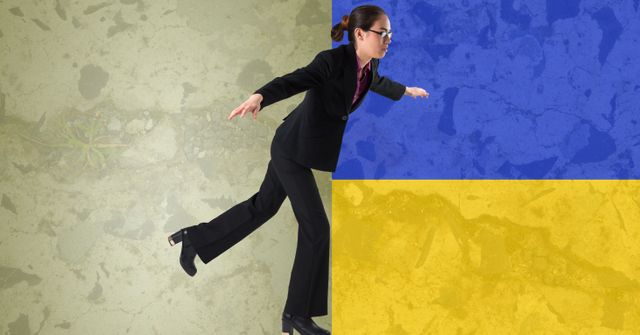 Asian businesswoman balancing on one feet against ukraine flag design background. ukraine crisis, invasion and international relations concept
