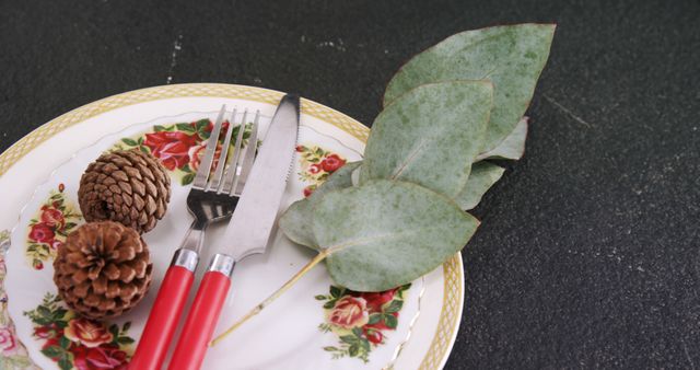 Elegant Table Setting with Vintage Plate and Pine Cones - Download Free Stock Images Pikwizard.com