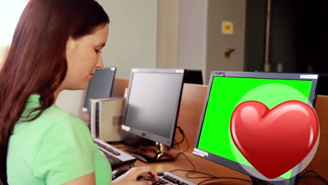 Student Using Computers with Love for Education