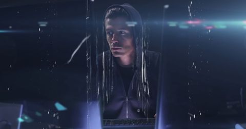 Male Hacker Engaging in Intense Digital Interface Distortion - Download Free Stock Images Pikwizard.com